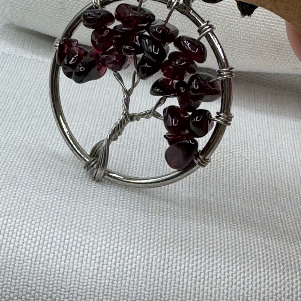 Tree of life pendant 1.25 inch round reddish purple color